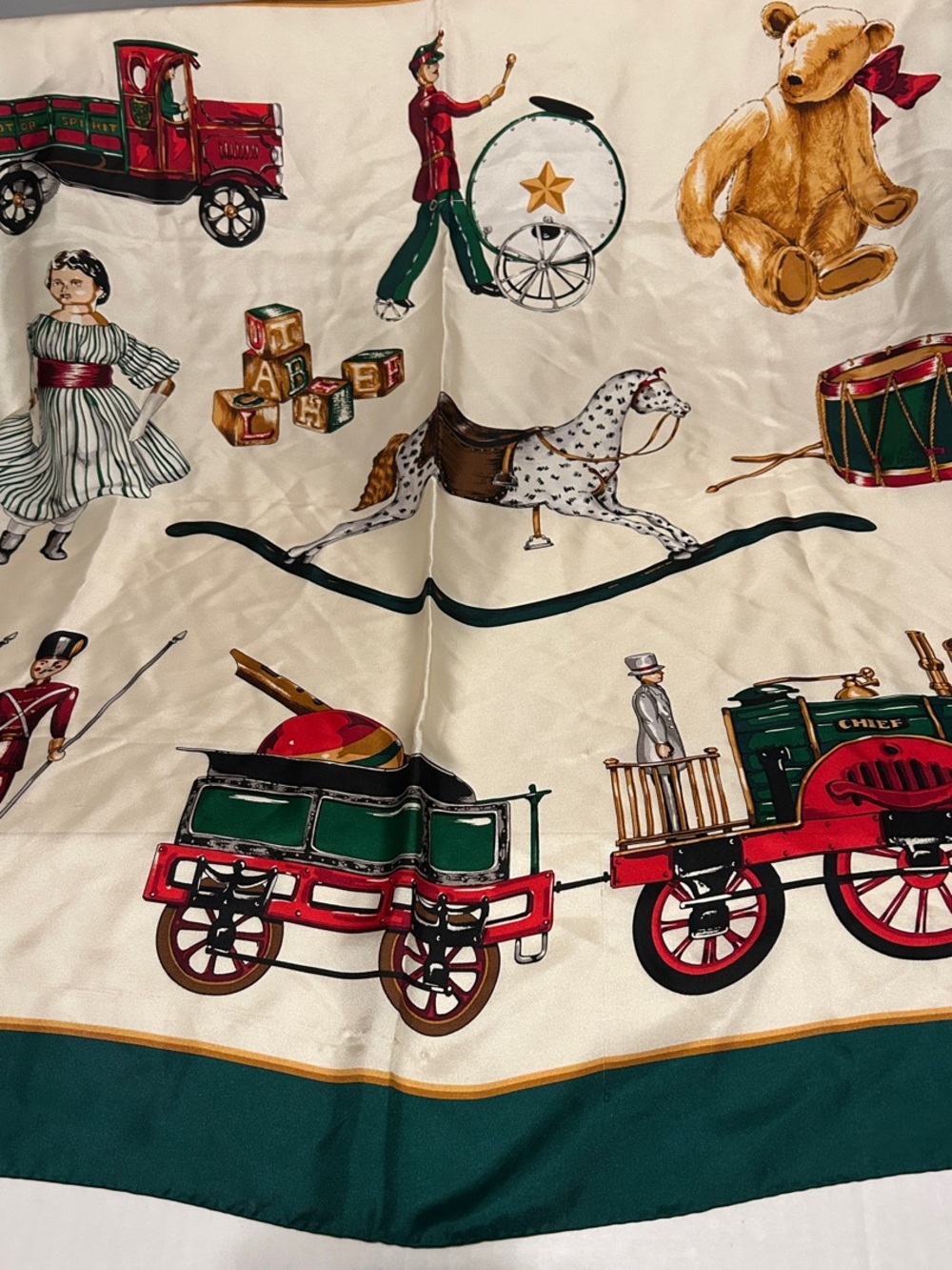 Echo Cream Scarf with Green and Red Toy Train & Teddy Motif